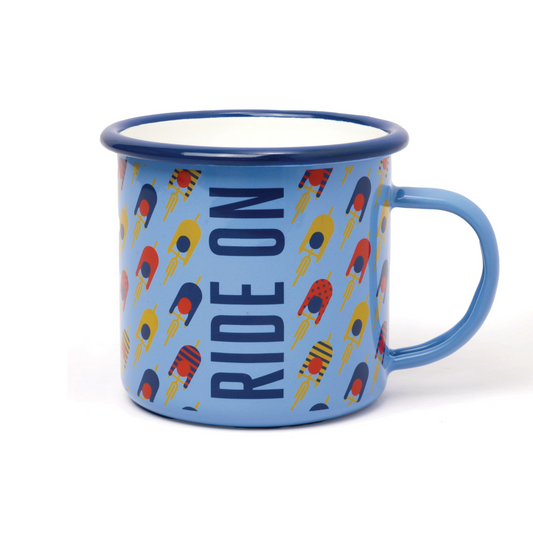blue mug with "ride on" written on it and yellow, red and blue images of cyclists. on white background.