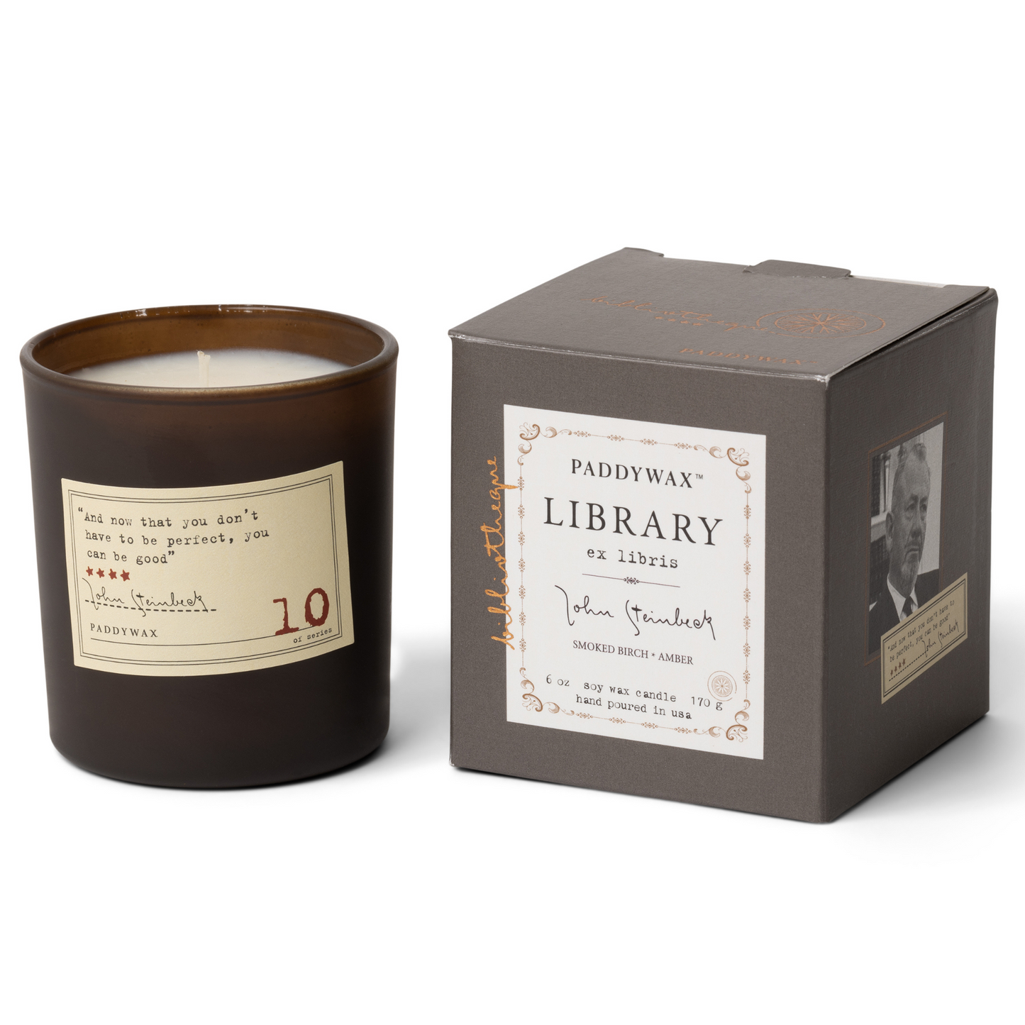 Black candle next to grey box