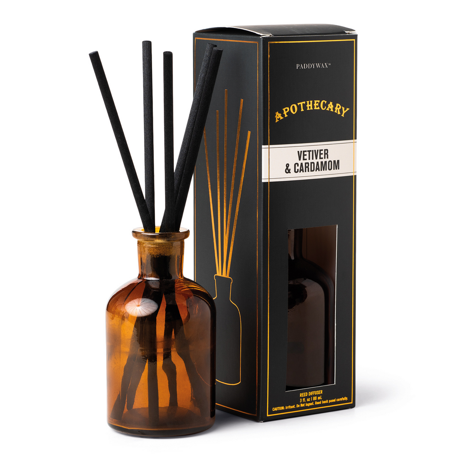 Amber coloured bottle with a tall black box next to it.