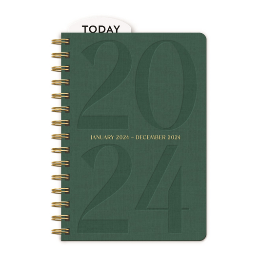 emerald green planner with 2024 written on the front.