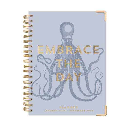 baby blue journal with "embrace the day" written on the front with an image of an octopus.